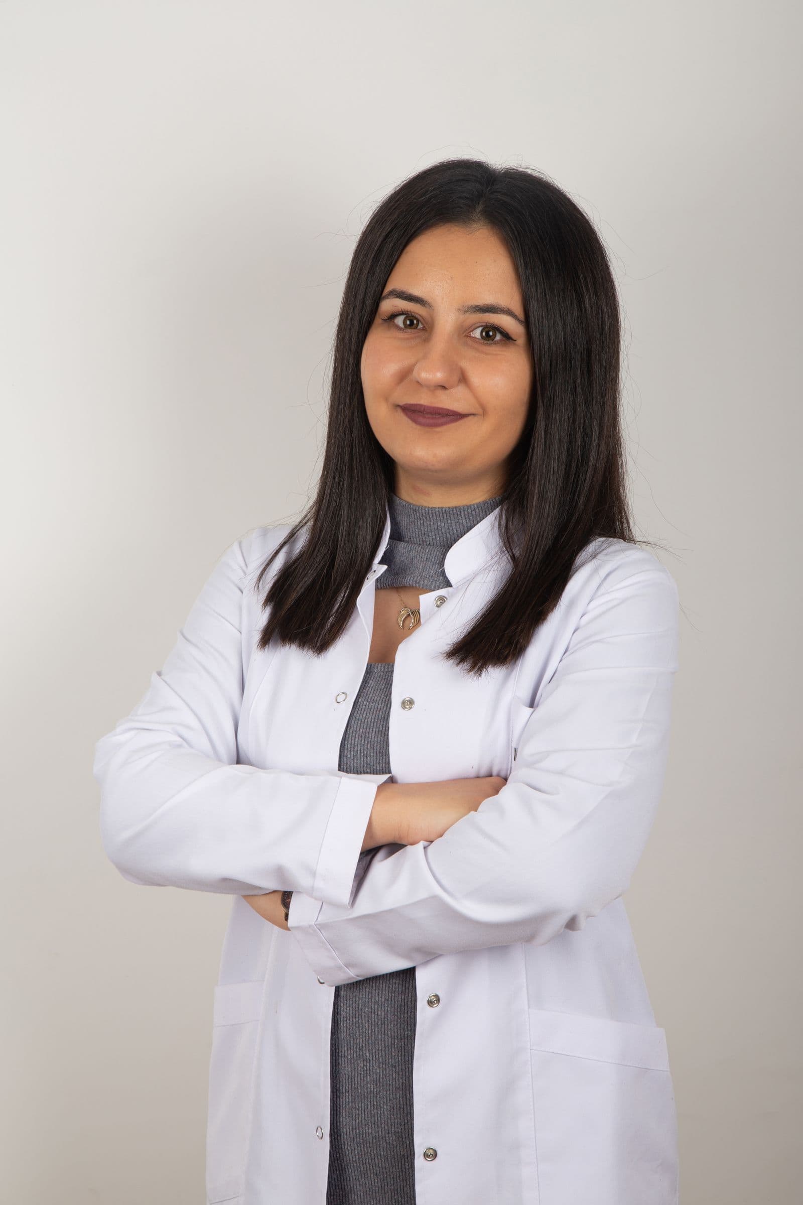 Healthcare professional wearing a plain white coat